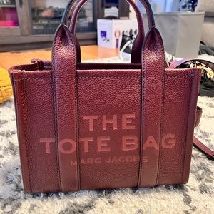 Wine red colored Marc jacobs mini leather tote